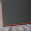Cow Track Ranch leather album logo stamp