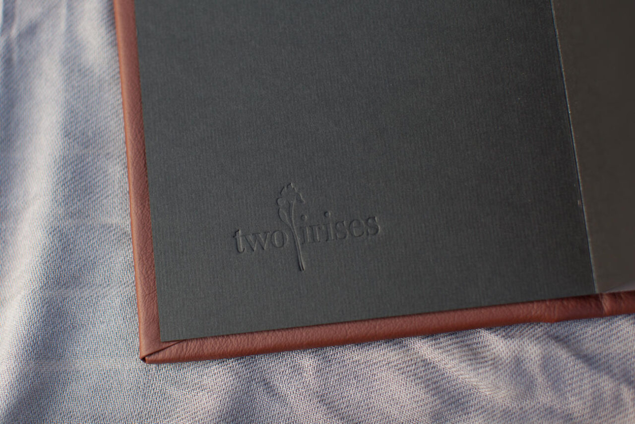 Cow Track Ranch leather album logo stamp
